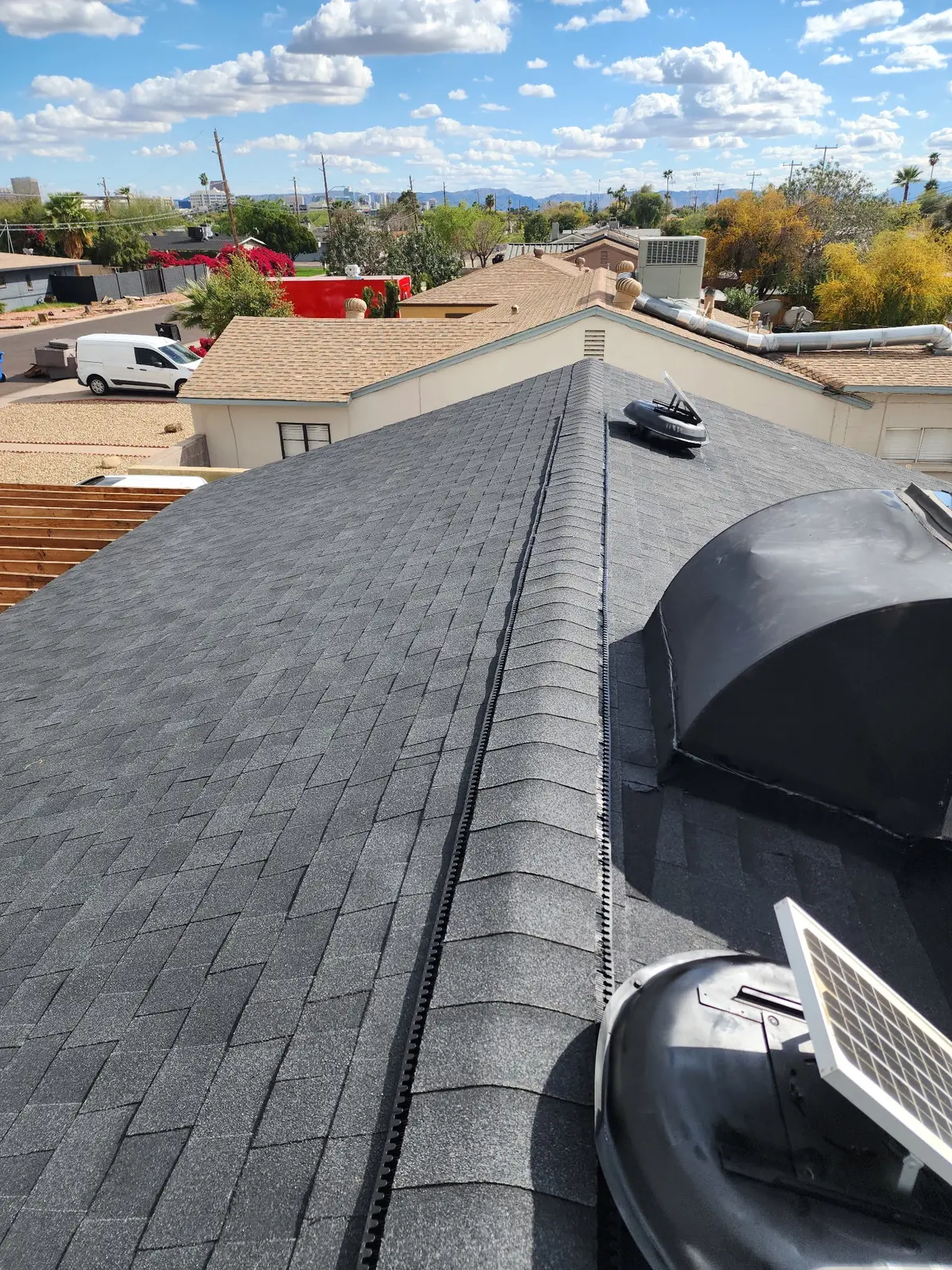 Finished ridge cap detail on Arcadia shingle roof