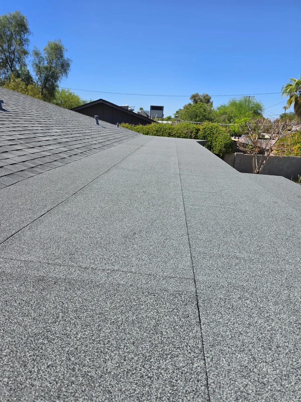 Completed low-slope roofing section on Scottsdale home