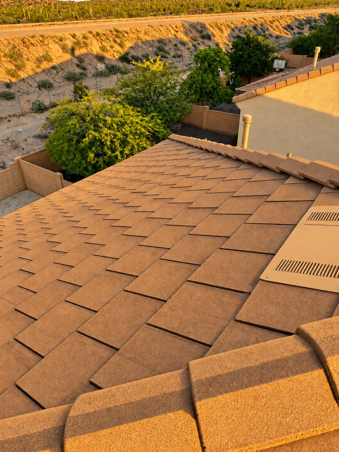 Completed Phoenix tile roof ridge and eave detail