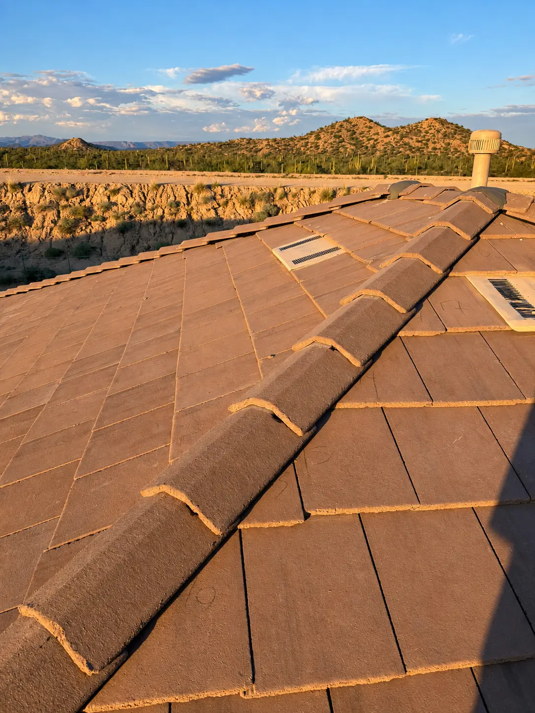 Completed ridge tile on a Phoenix concrete tile roof