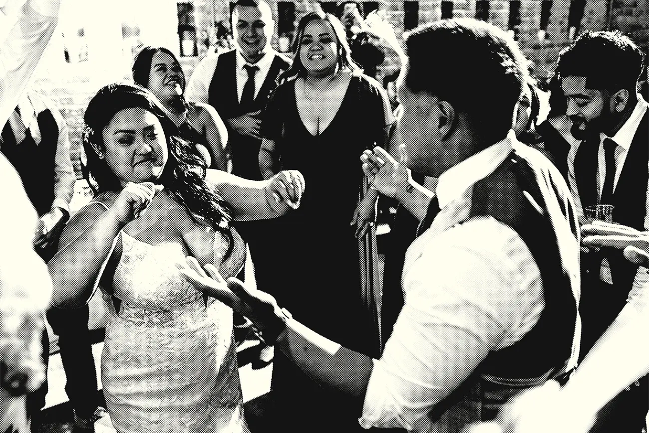 A couple dancing at their wedding reception.