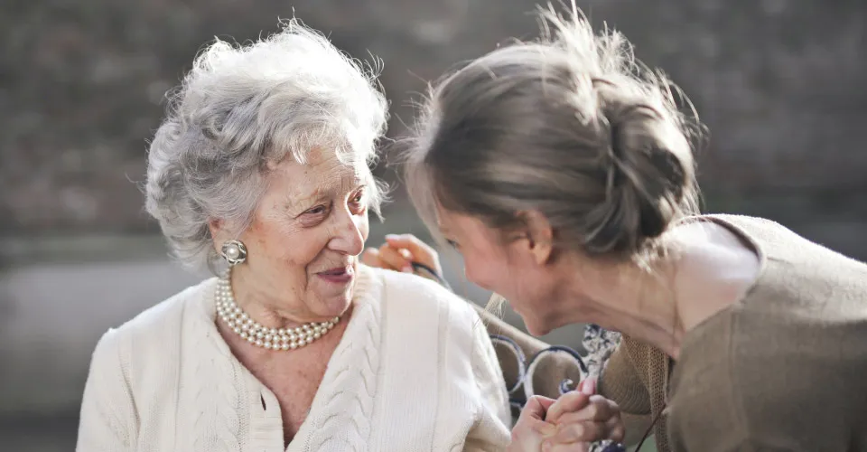 elderly woman with family