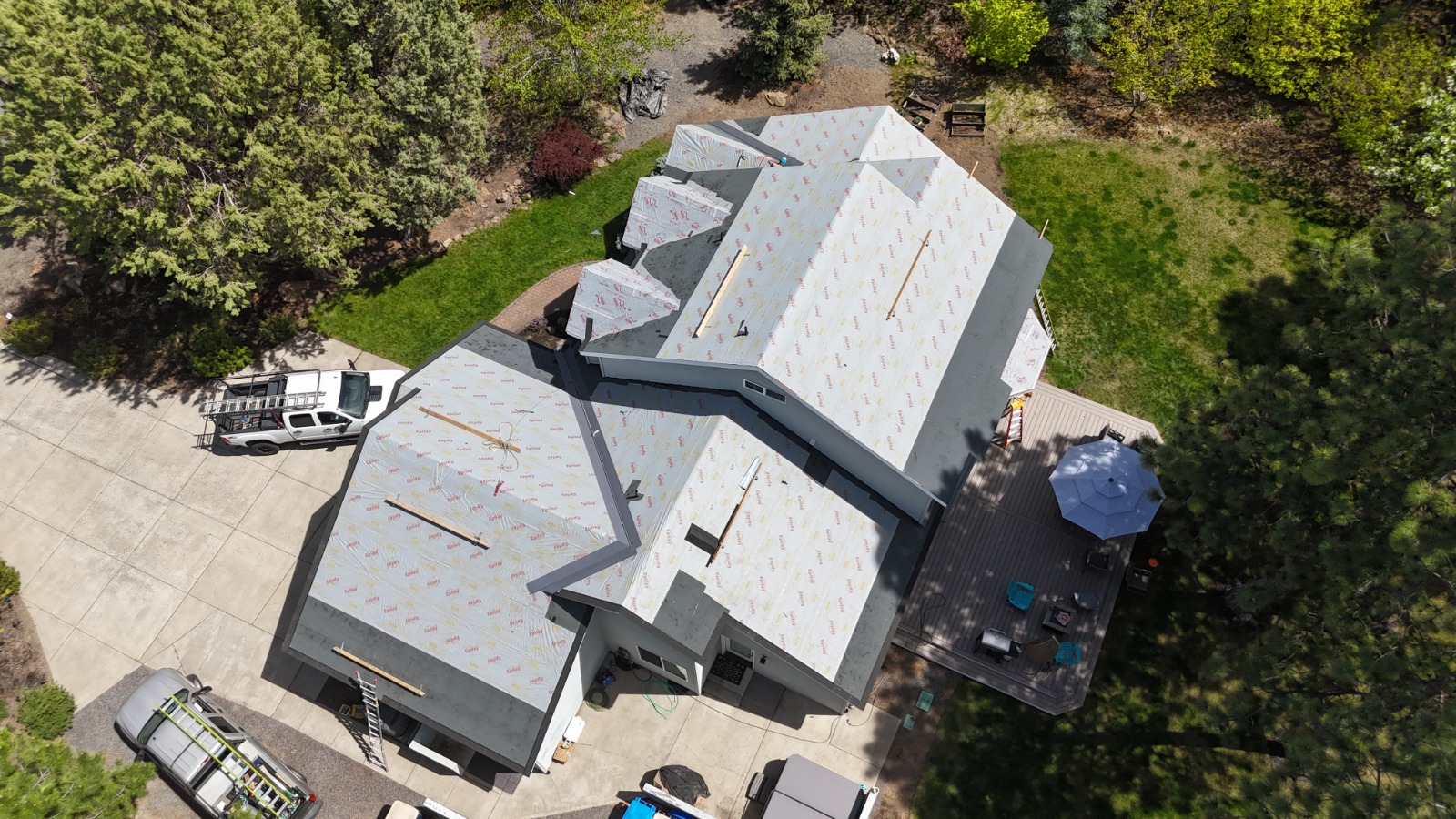 Scott's Roofing team installing roof