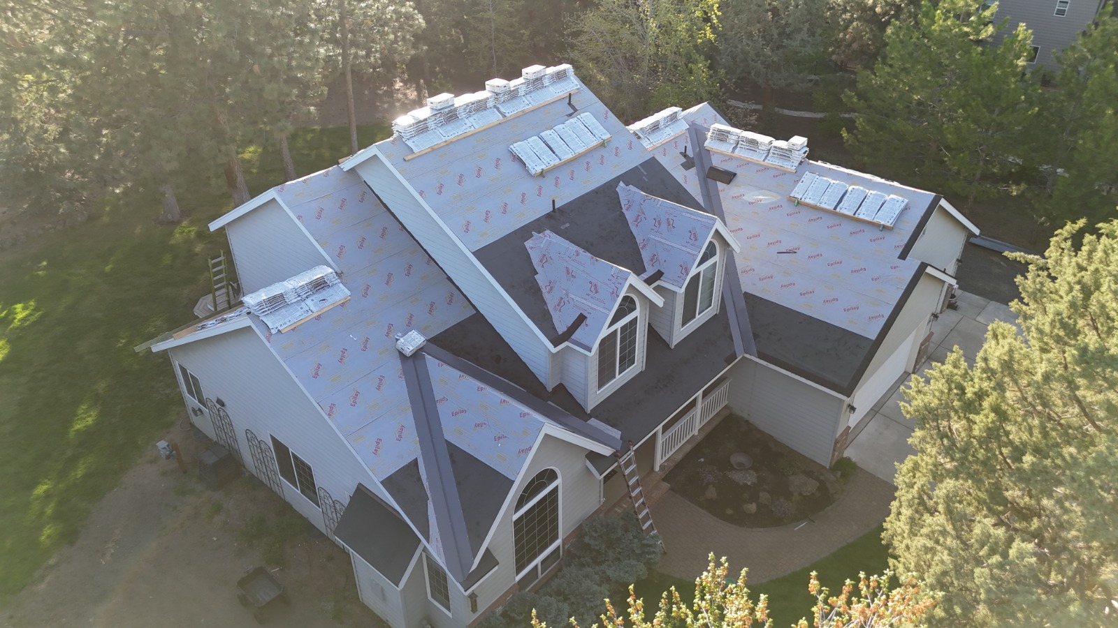 Scott's Roofing team installing roof