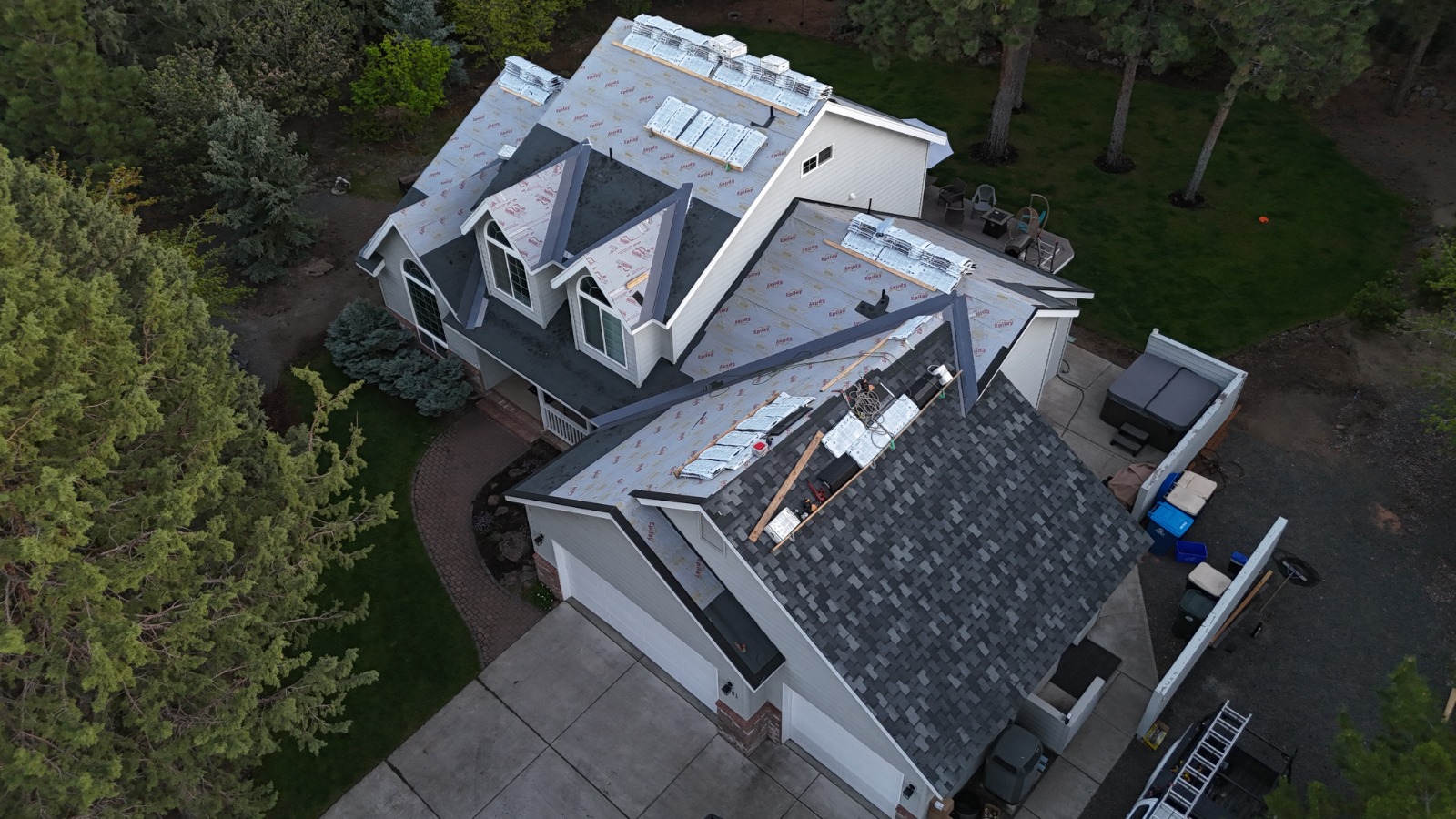 Scott's Roofing team installing roof