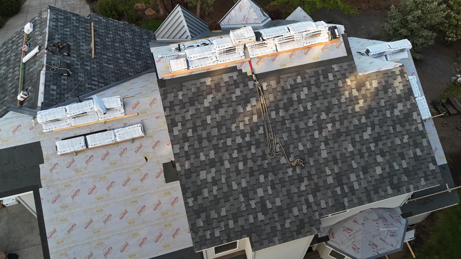 Scott's Roofing team installing roof