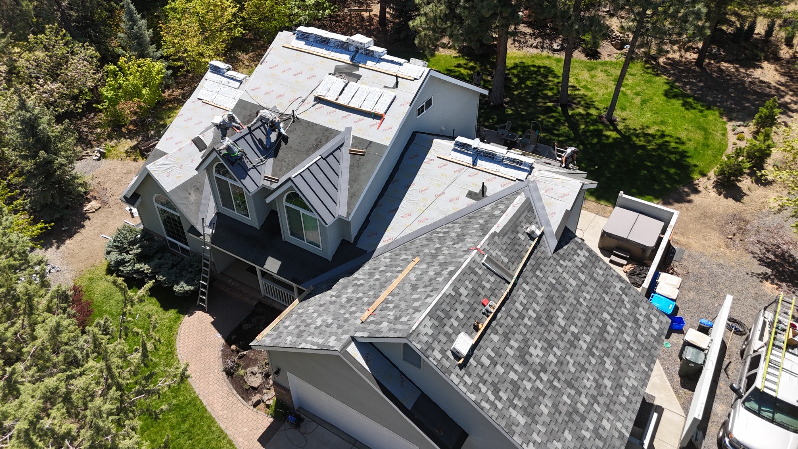 Scott's Roofing team installing roof
