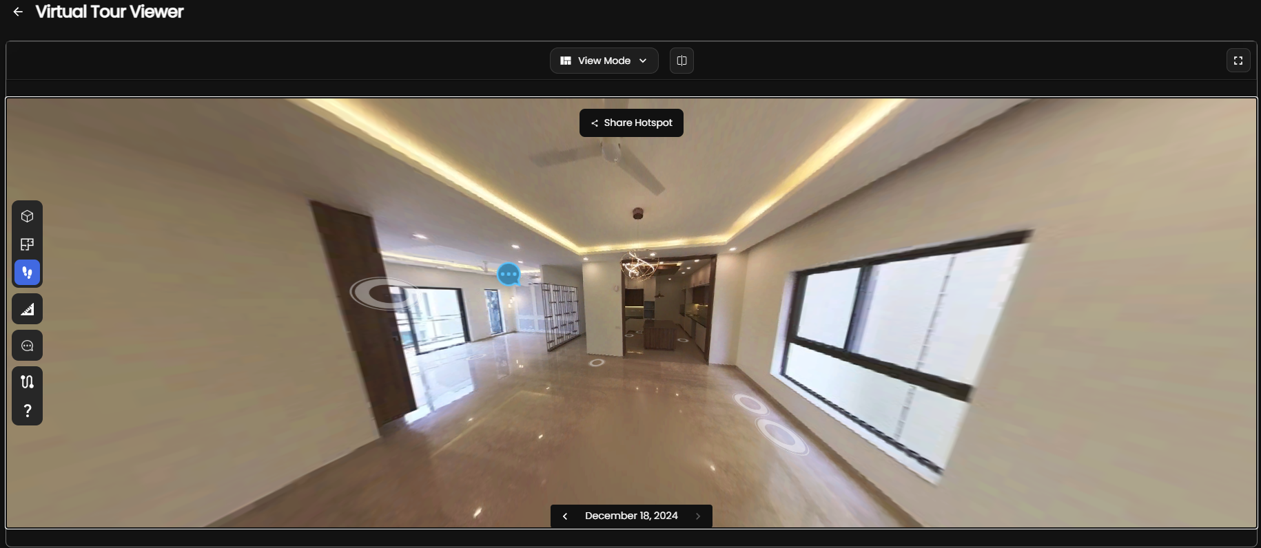 A person uses a 360-degree camera to create a 3D model of a space.