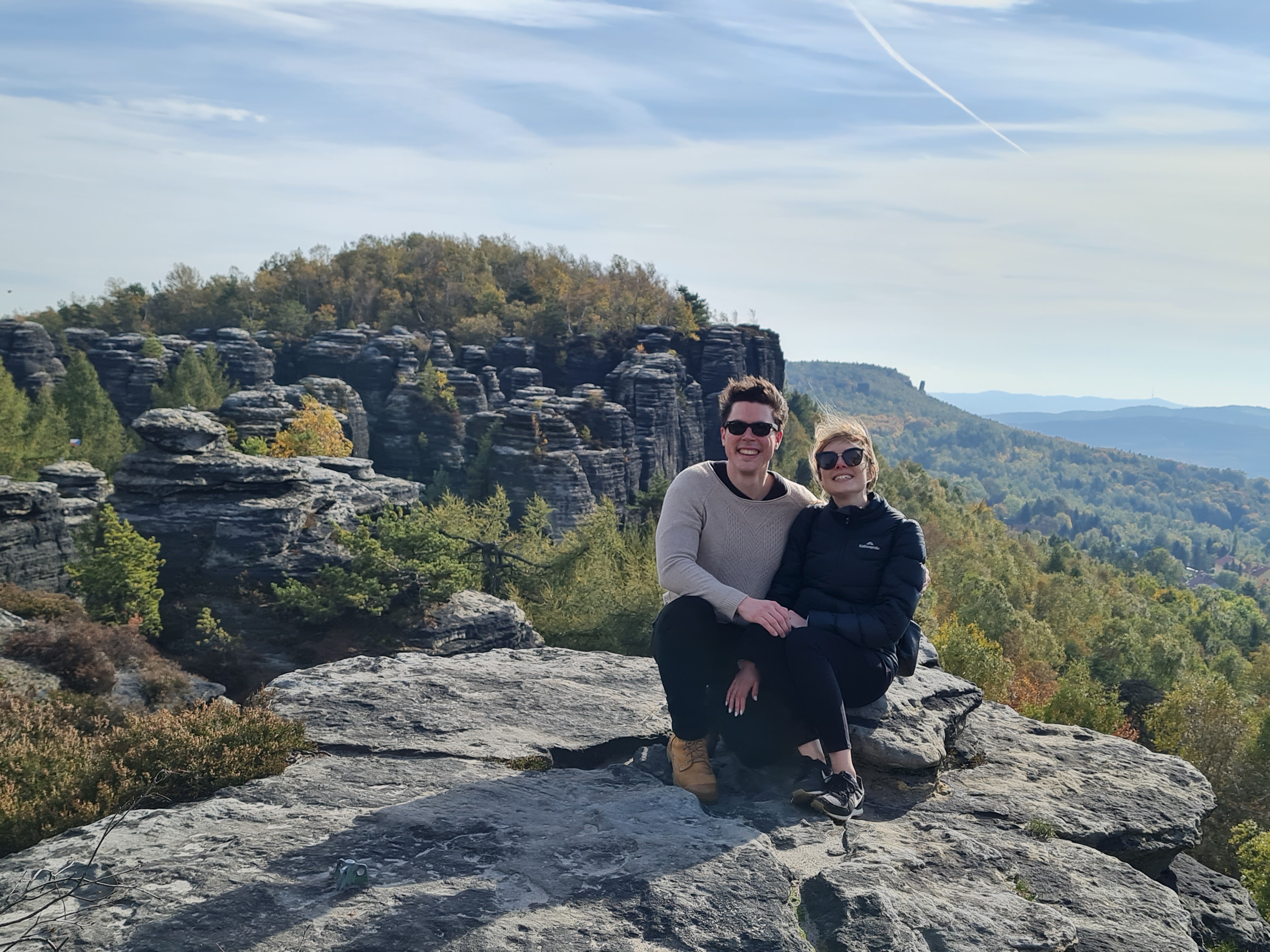 Hikers relaxing at a Narnia Rocks viewpoint in Tisa
