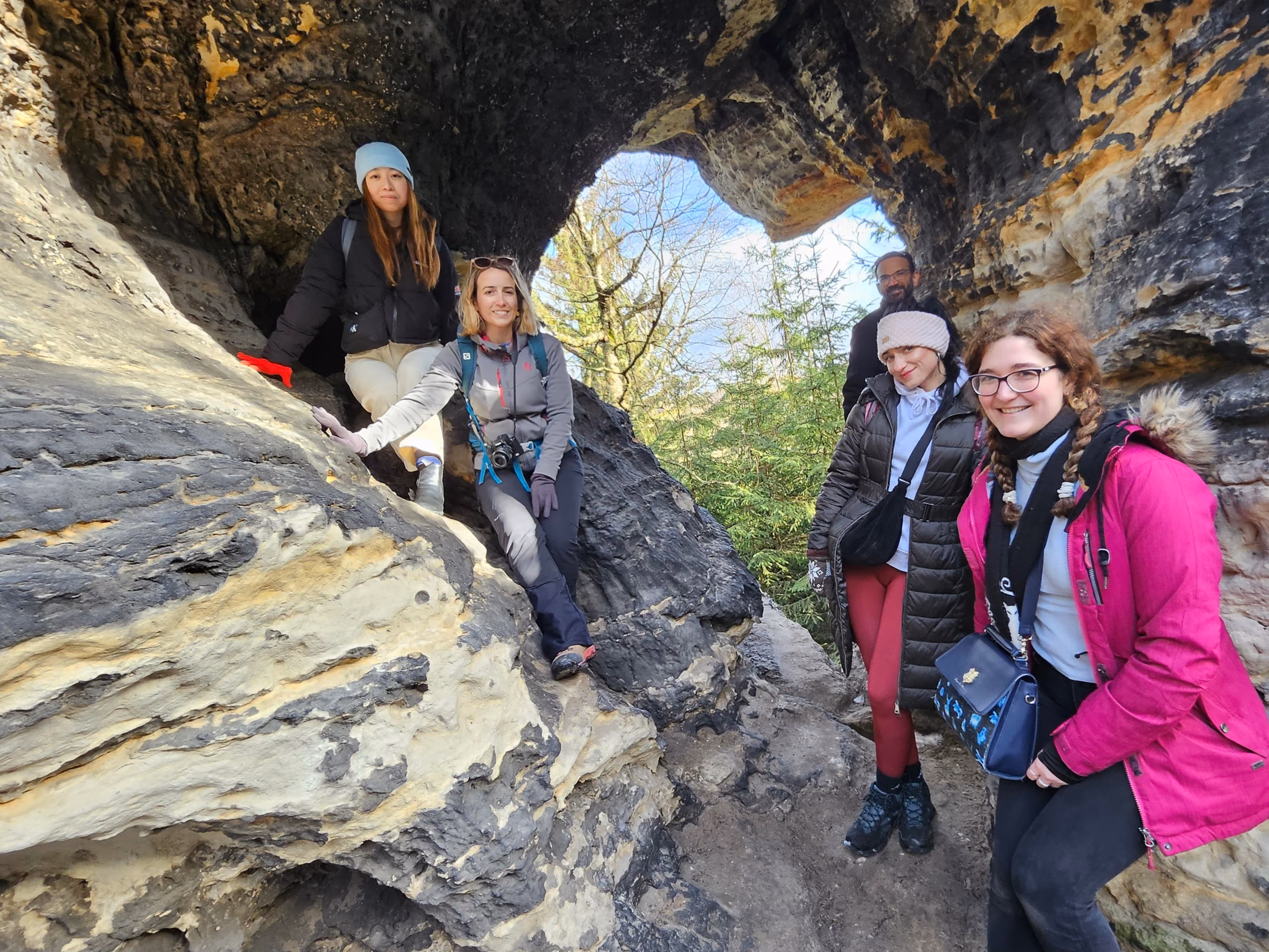 Group exploring the Narnia sandstone labyrinth in Tisa