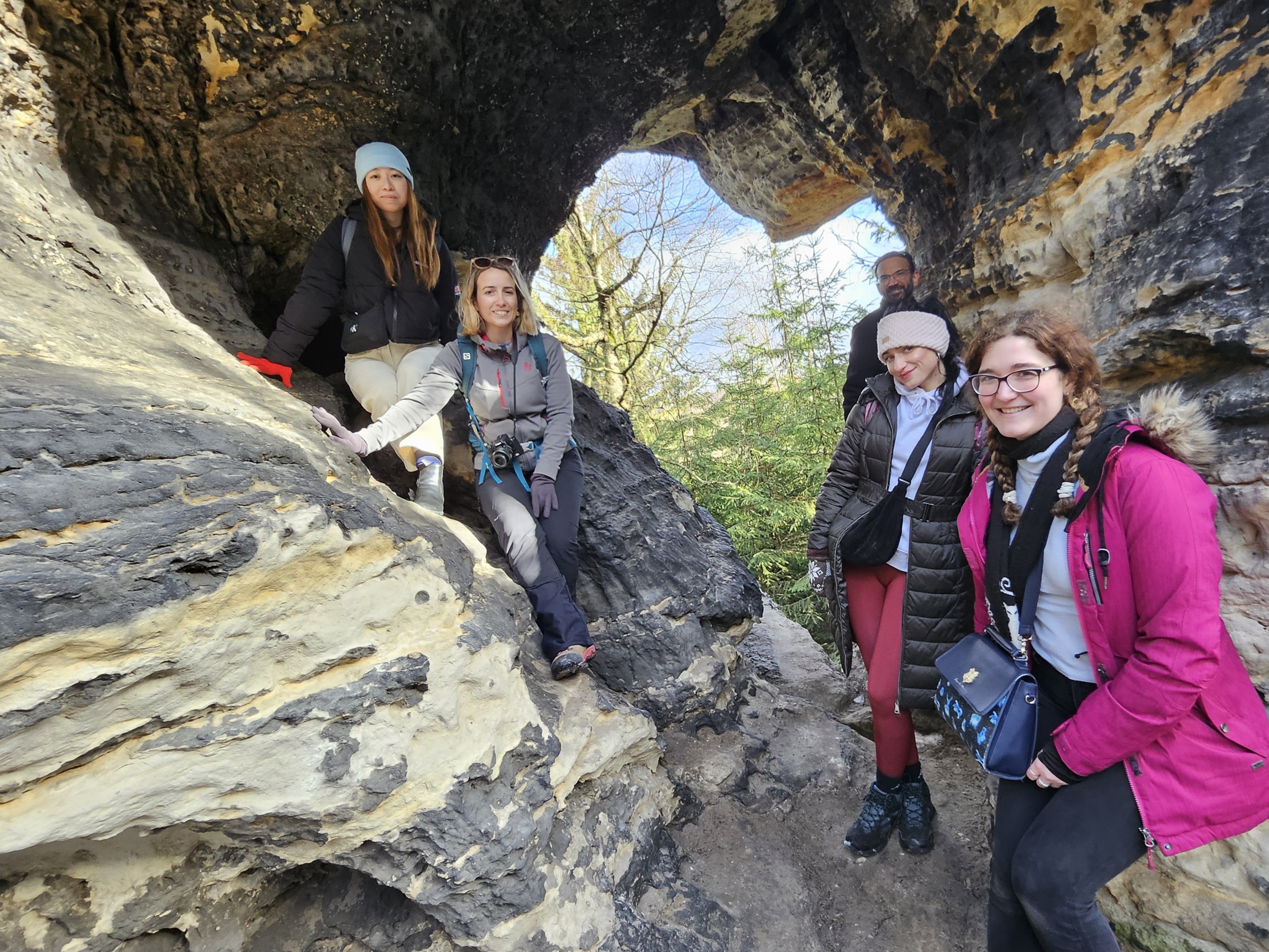 Group exploring the Narnia sandstone labyrinth in Tisa