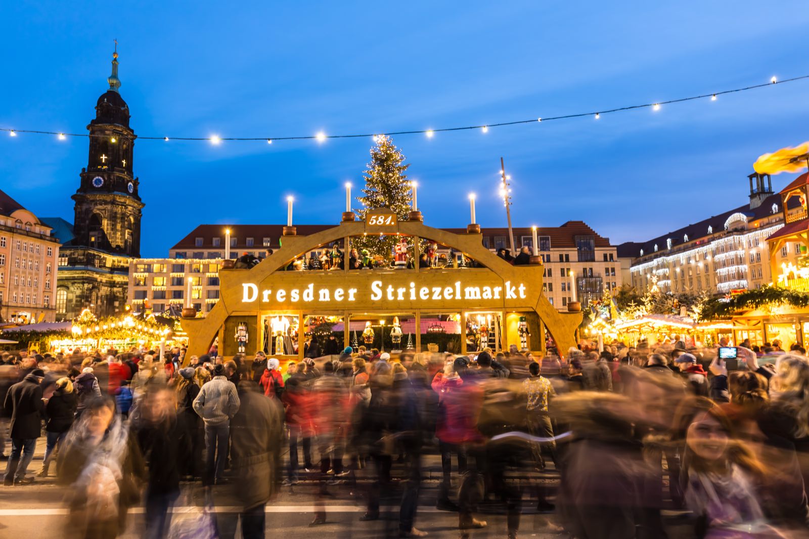 Entrance arch of the Dresdner Striezelmarkt lit up for Christmas.