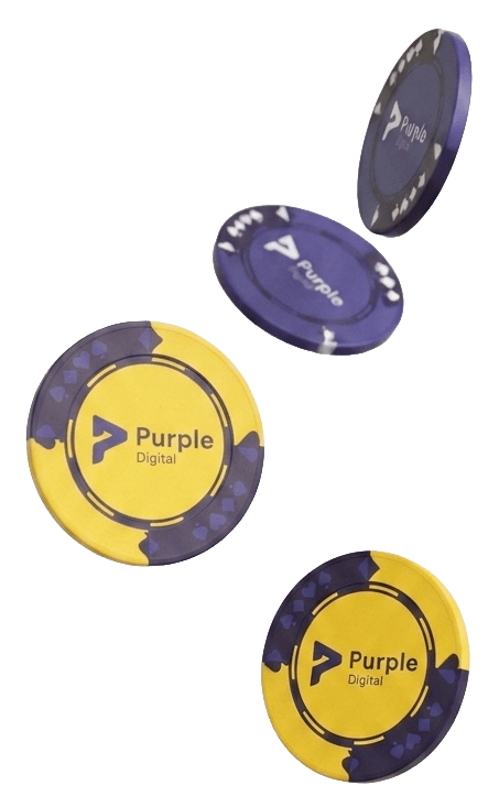 Four yellow and purple poker chips with Purple Digital logo on them appearing to be falling.