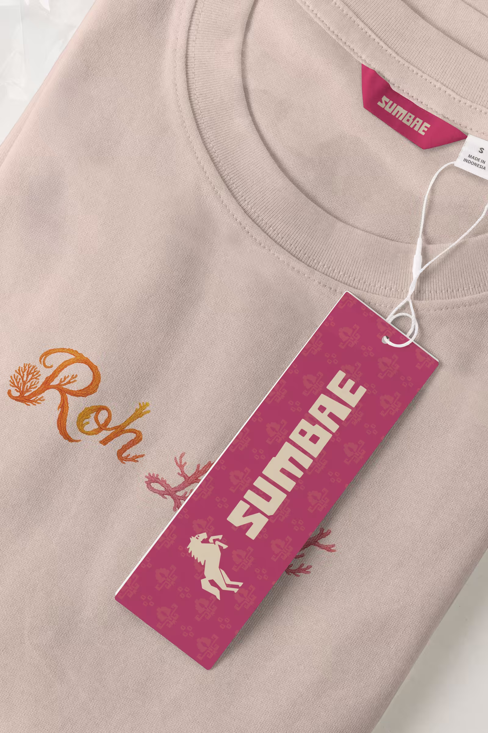 Sumbae tshirt emphasizing clothing tags