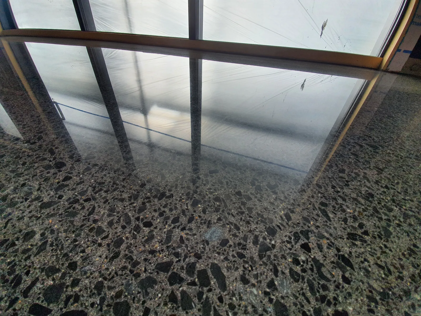 Clarks Beach Black Oxide Floor - polished concrete floor