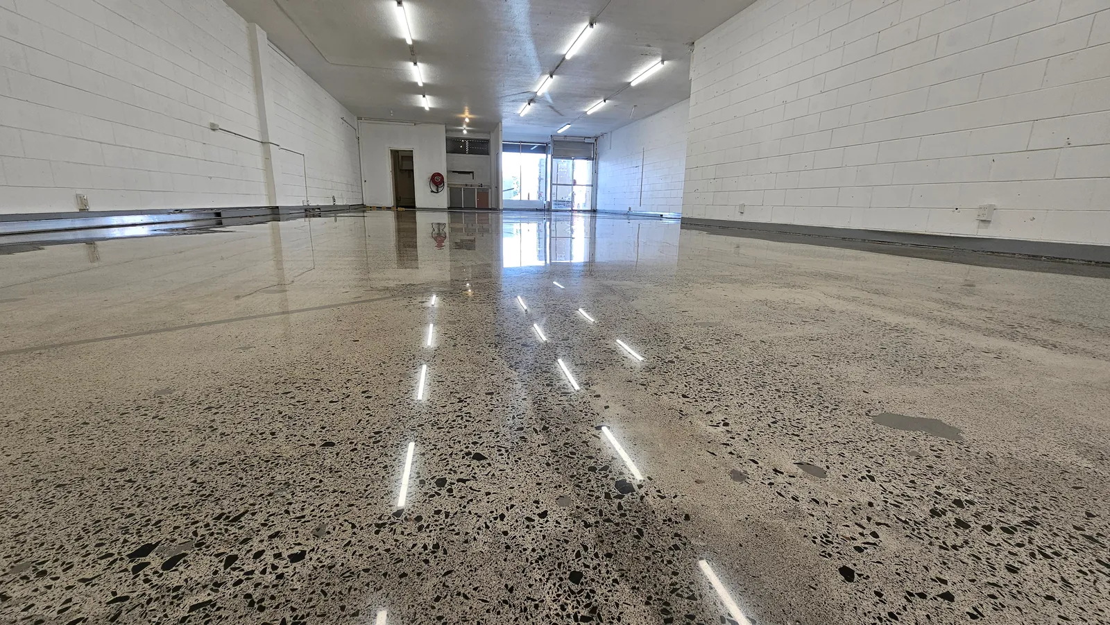 Mangere Central Barber Shop - polished concrete floor
