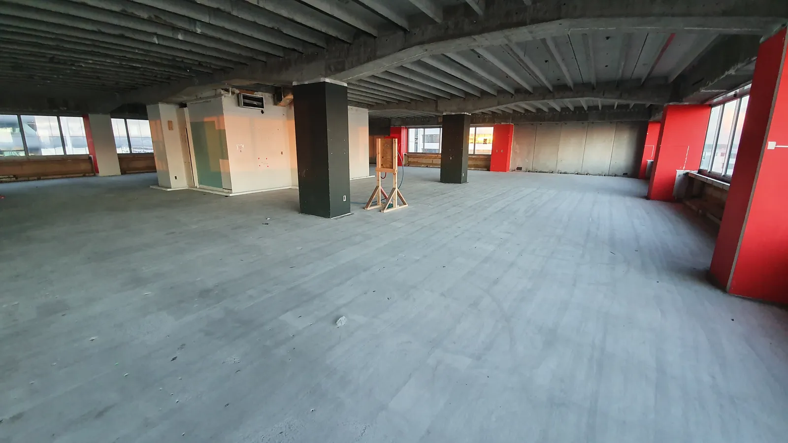 Diamond Shine Concrete commercial floor prep grinding in a large Auckland office building