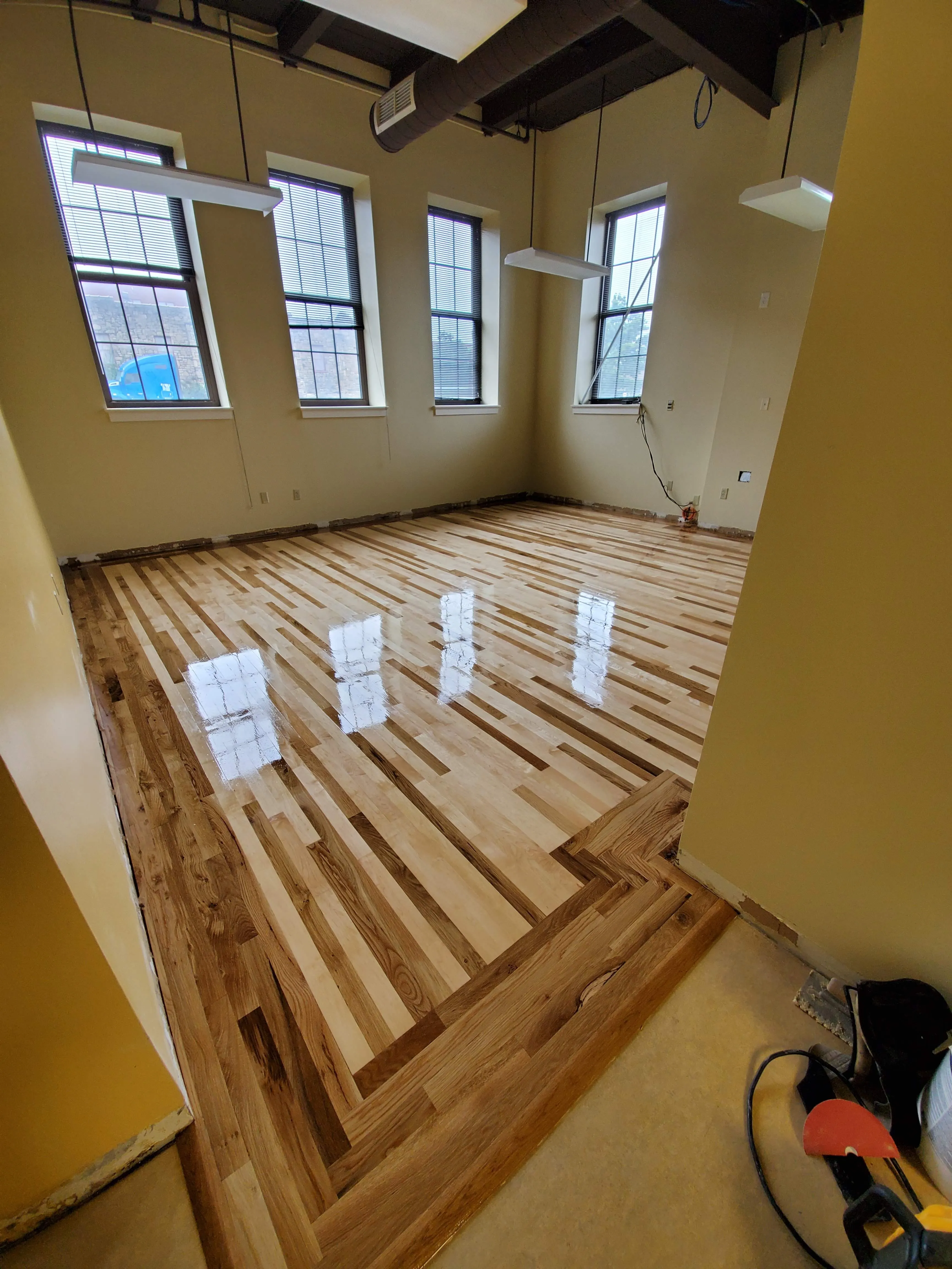 A kitchen with new LVP floors.