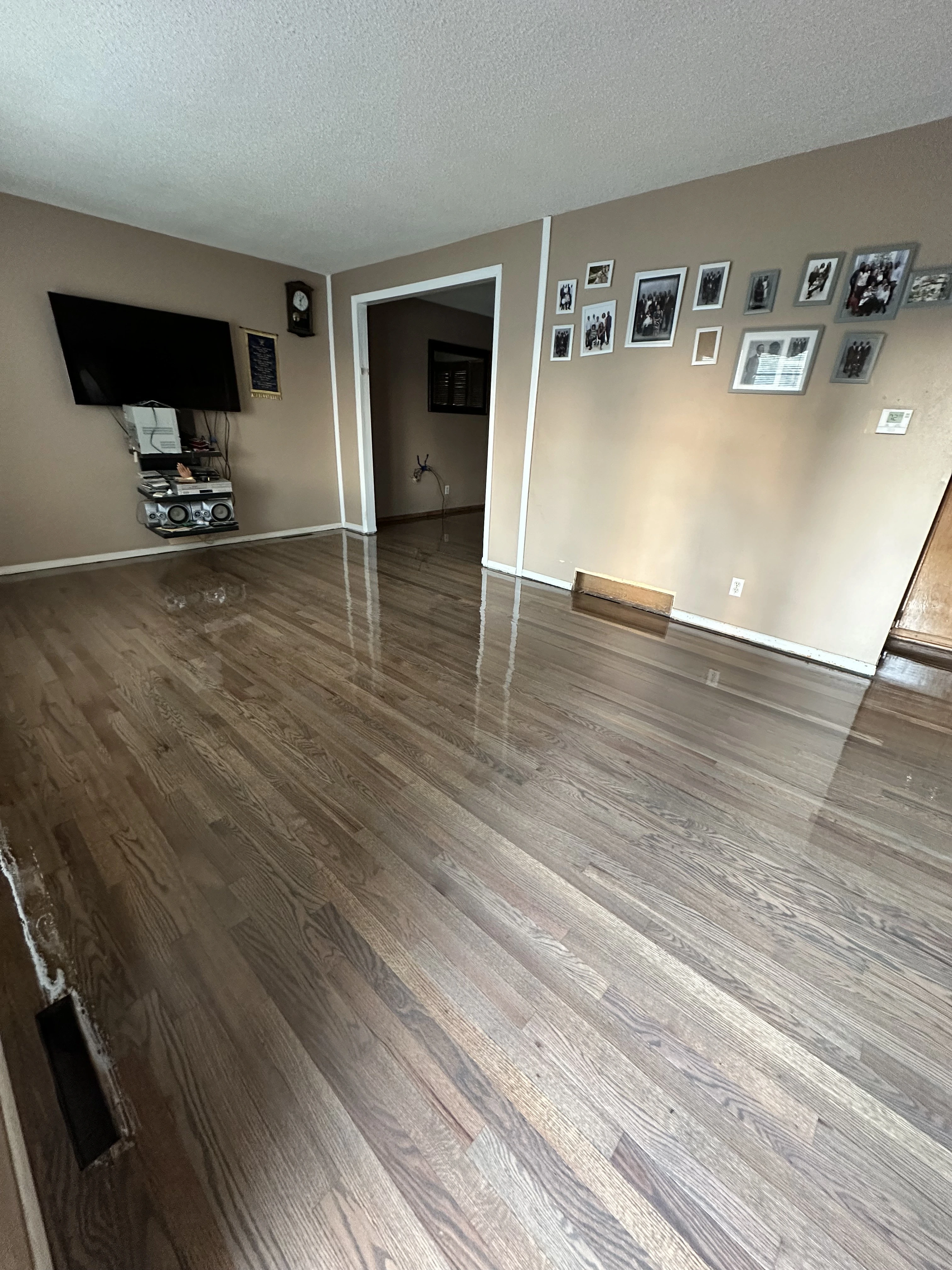 A kitchen with new LVP floors.