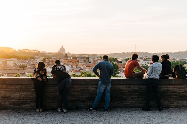 People enjoying the view from the Giardino degli Aranci in Rome, Italy