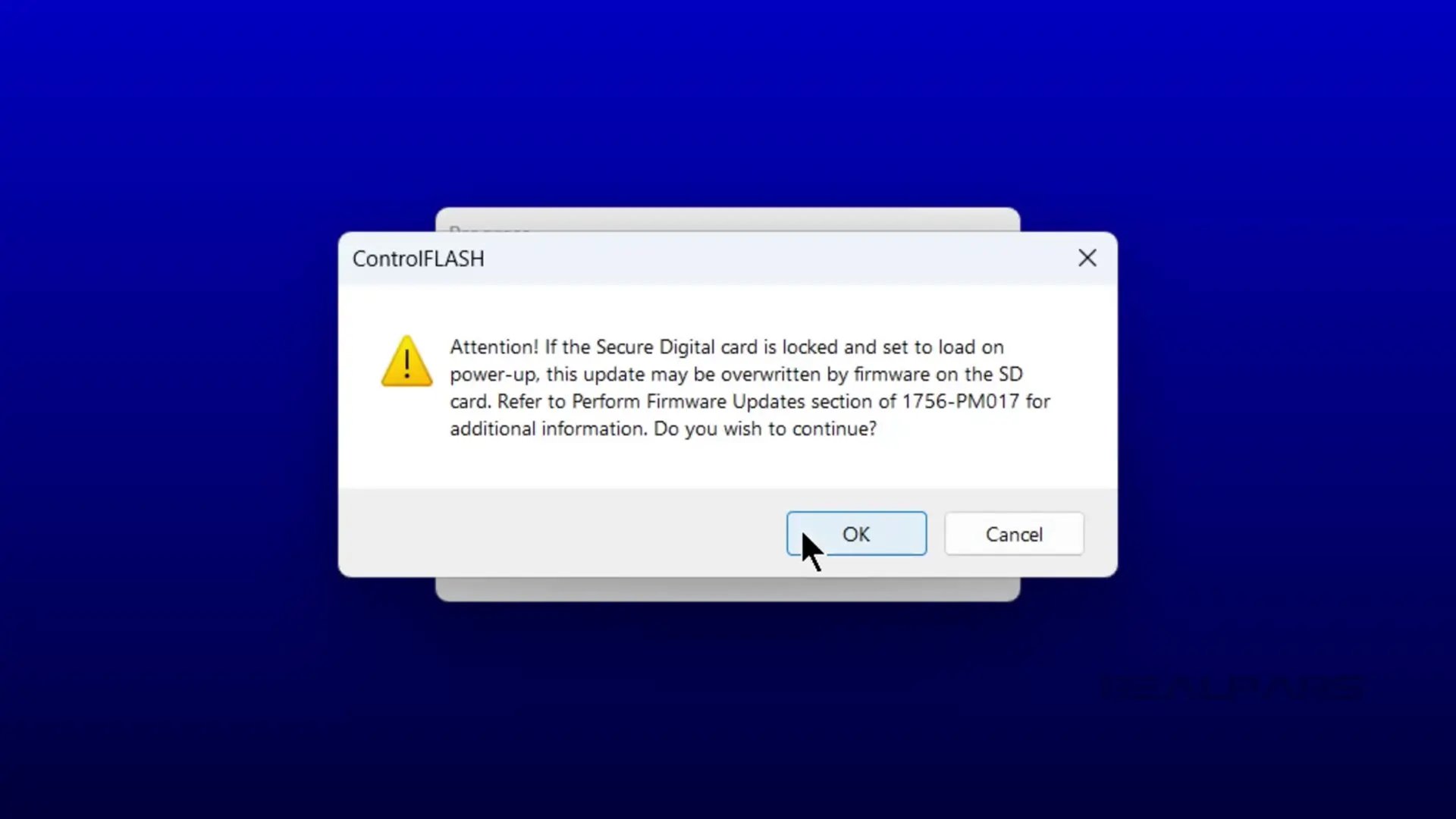 ControlFLASH warning message about SD card overwrite risk during firmware update with OK and Cancel options.