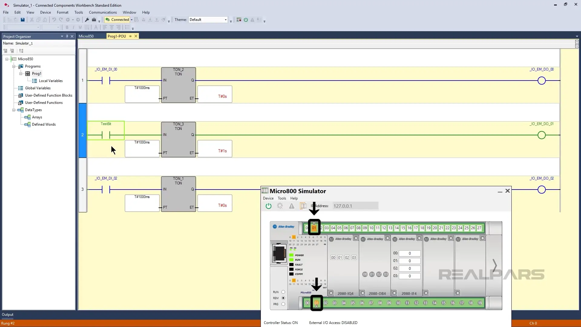 The Micro800 simulator showing output changes after toggling inputs in Connected Components Workbench.