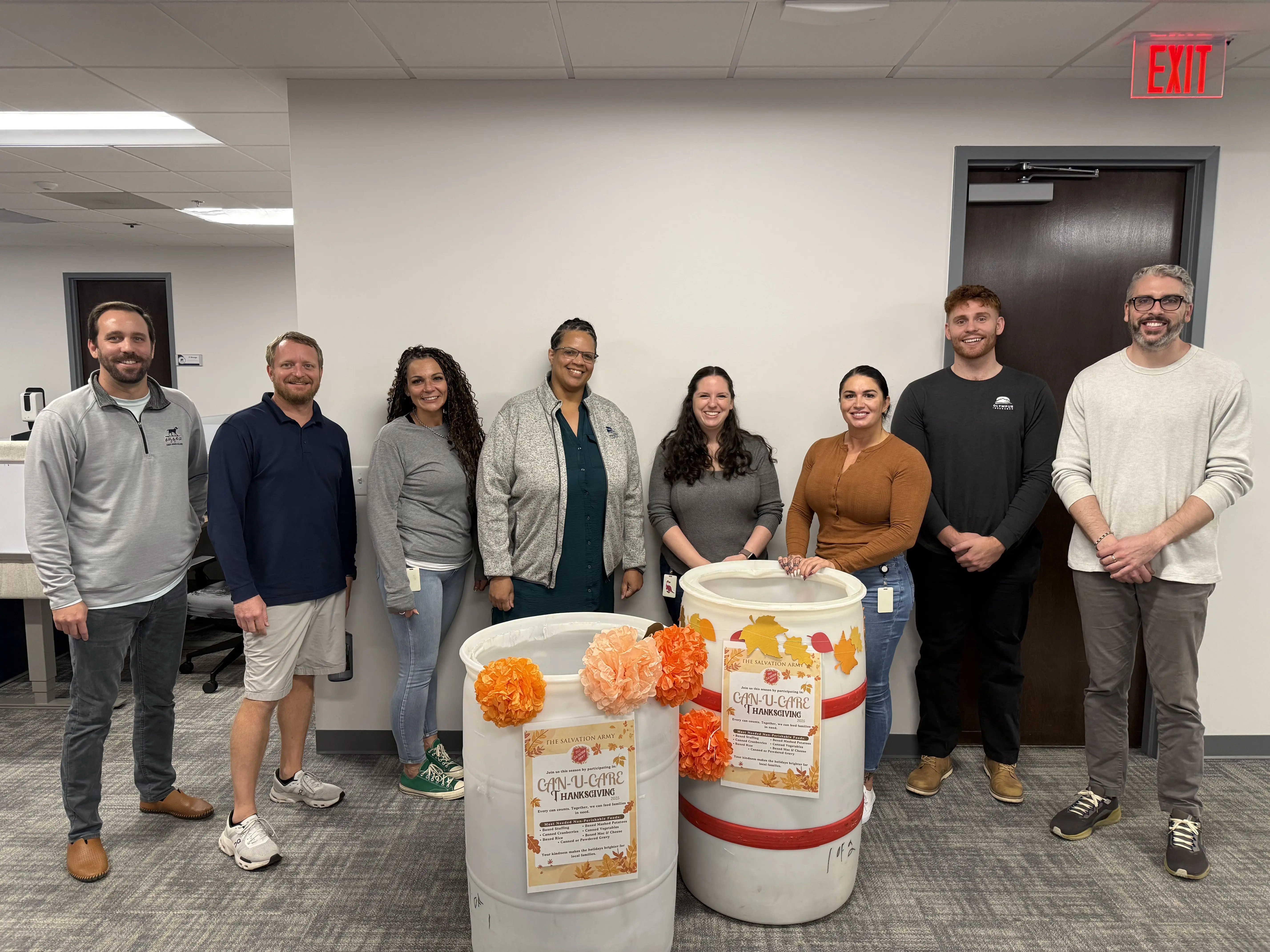 A room filled with lots of presents and a christmas tree.