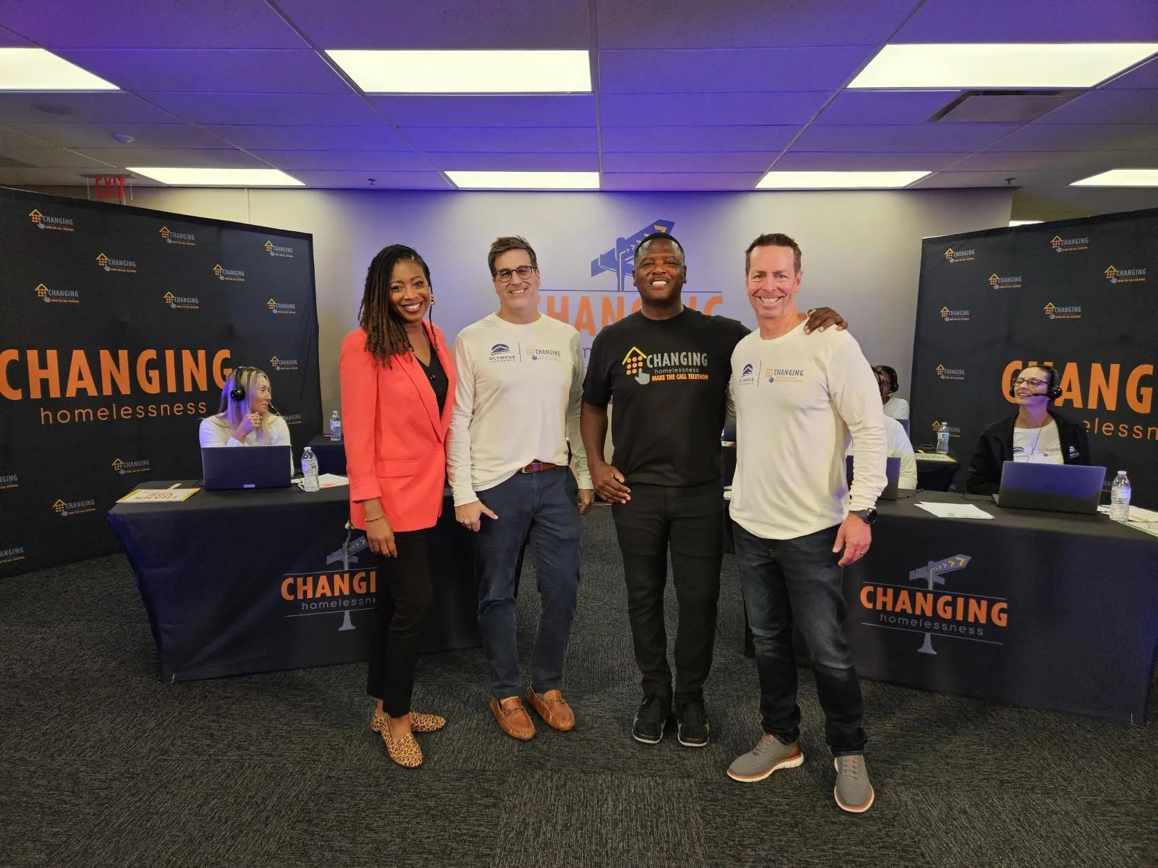 A room filled with lots of presents and a christmas tree.