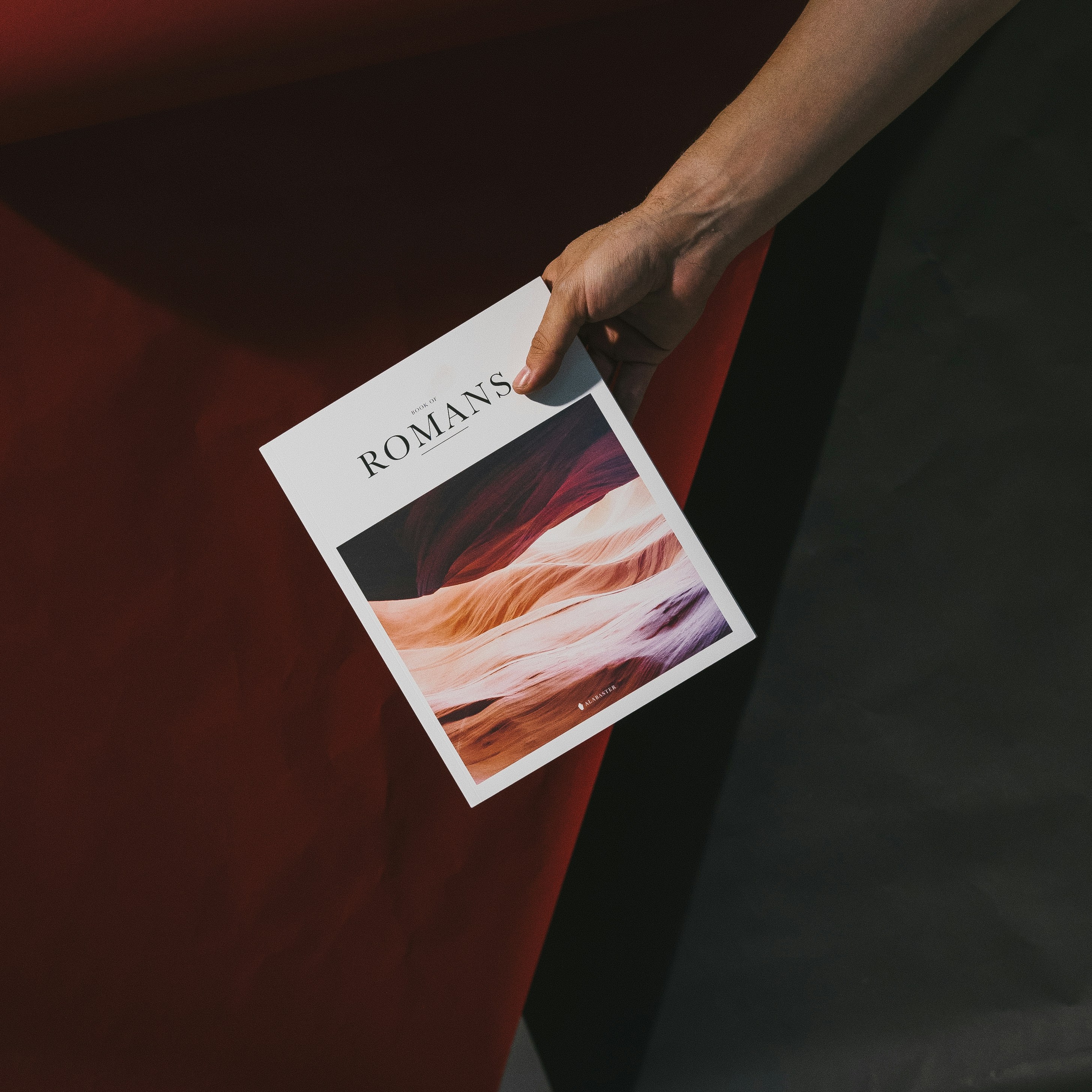 Folded flyers and brochures on black background