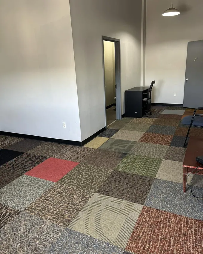 Clean office space with fresh carpet tiles after commercial cleaning in Miami