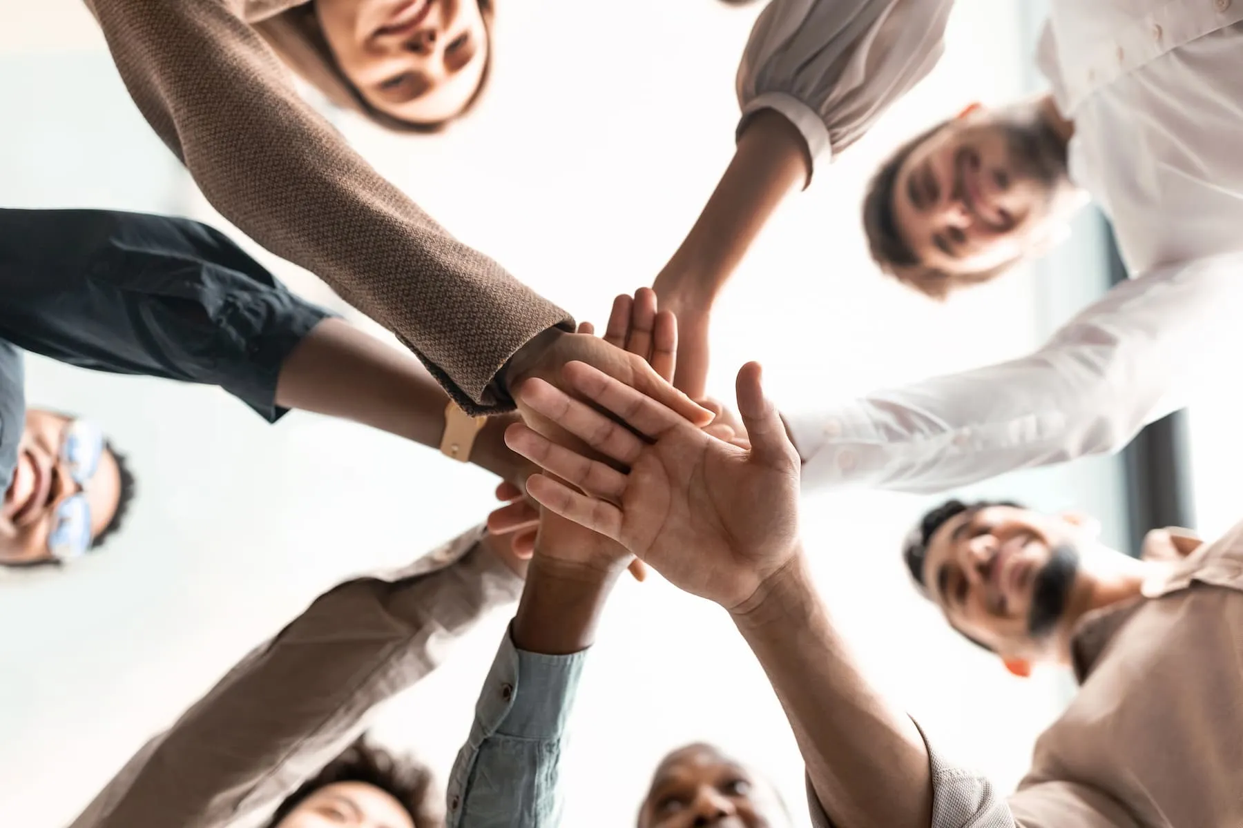 Team stacking hands