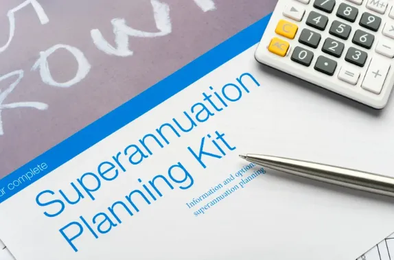 Superannuation Planning Kit document with pen and calculator, representing Australian retirement fund planning and financial preparation.