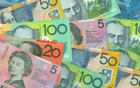 Various denominations of Australian dollar banknotes, including $5, $10, $20, $50, and $100 notes, symbolising income, savings, and financial growth.