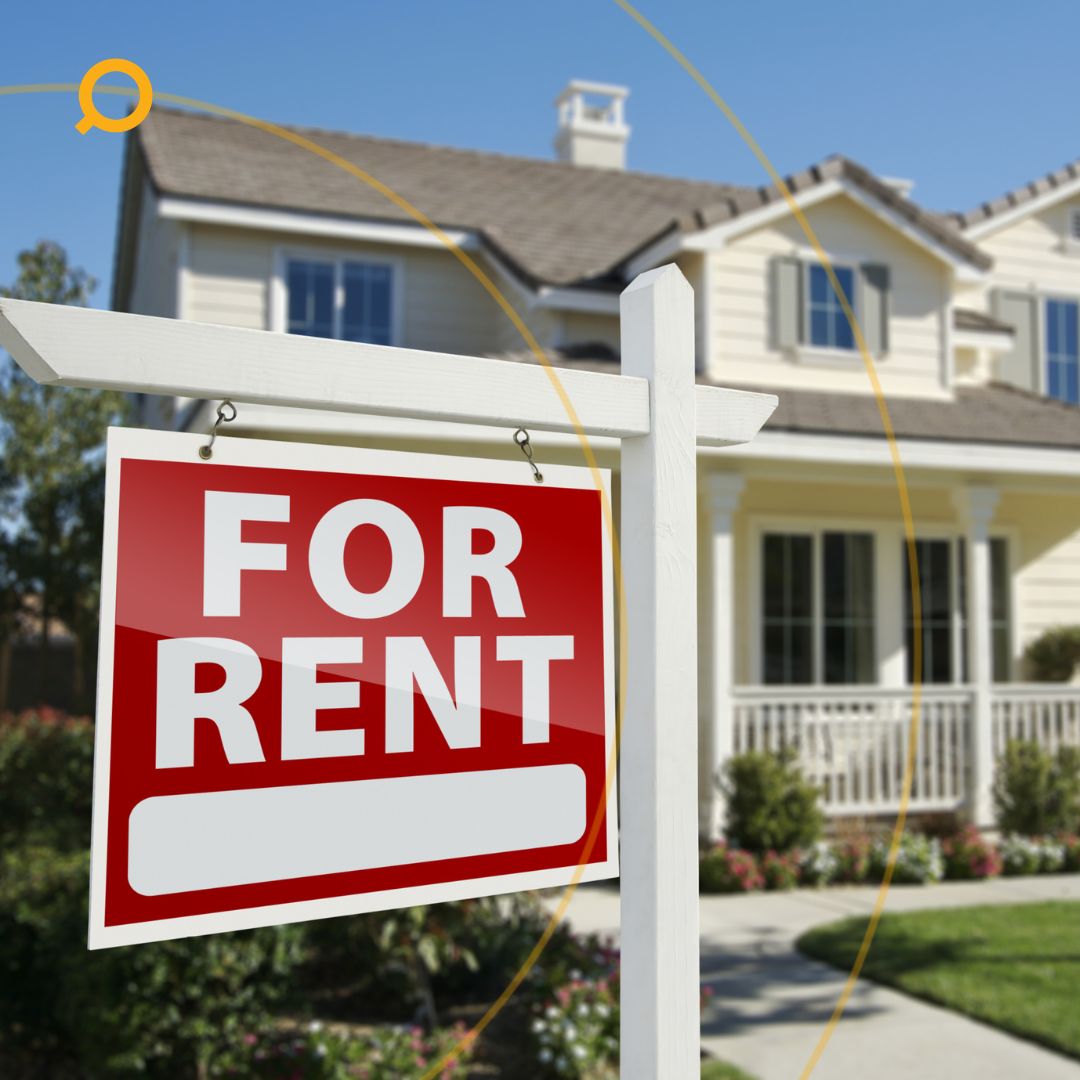 For Rent sign in front of a suburban house, representing rental property availability and real estate investment opportunity.
