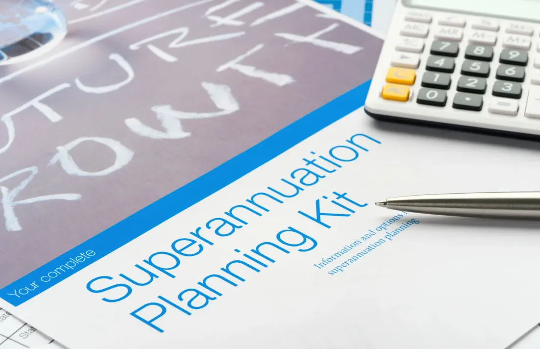 Superannuation planning kit with pen and calculator, highlighting financial planning and retirement strategies in Australia.