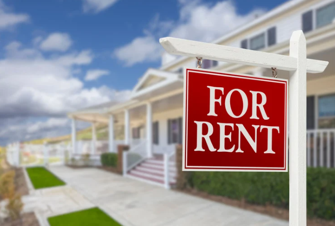  House with a “For Rent” sign in front, symbolising property investment opportunities and rental income potential. 