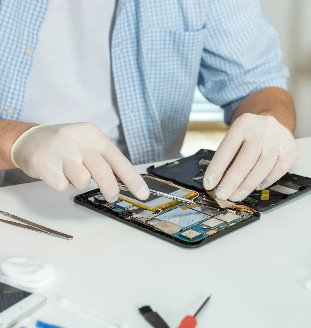 Technician repairing a tablet