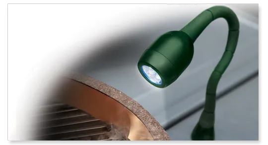 a green light that is on top of a table