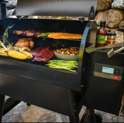 grill filled with veggies and meats