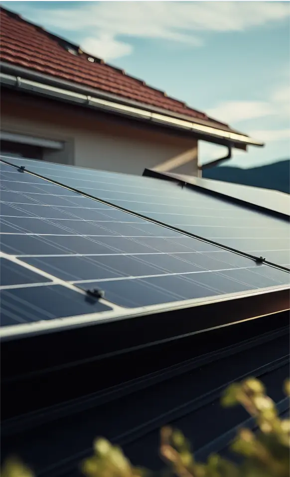 A solar panel on the roof of a house.