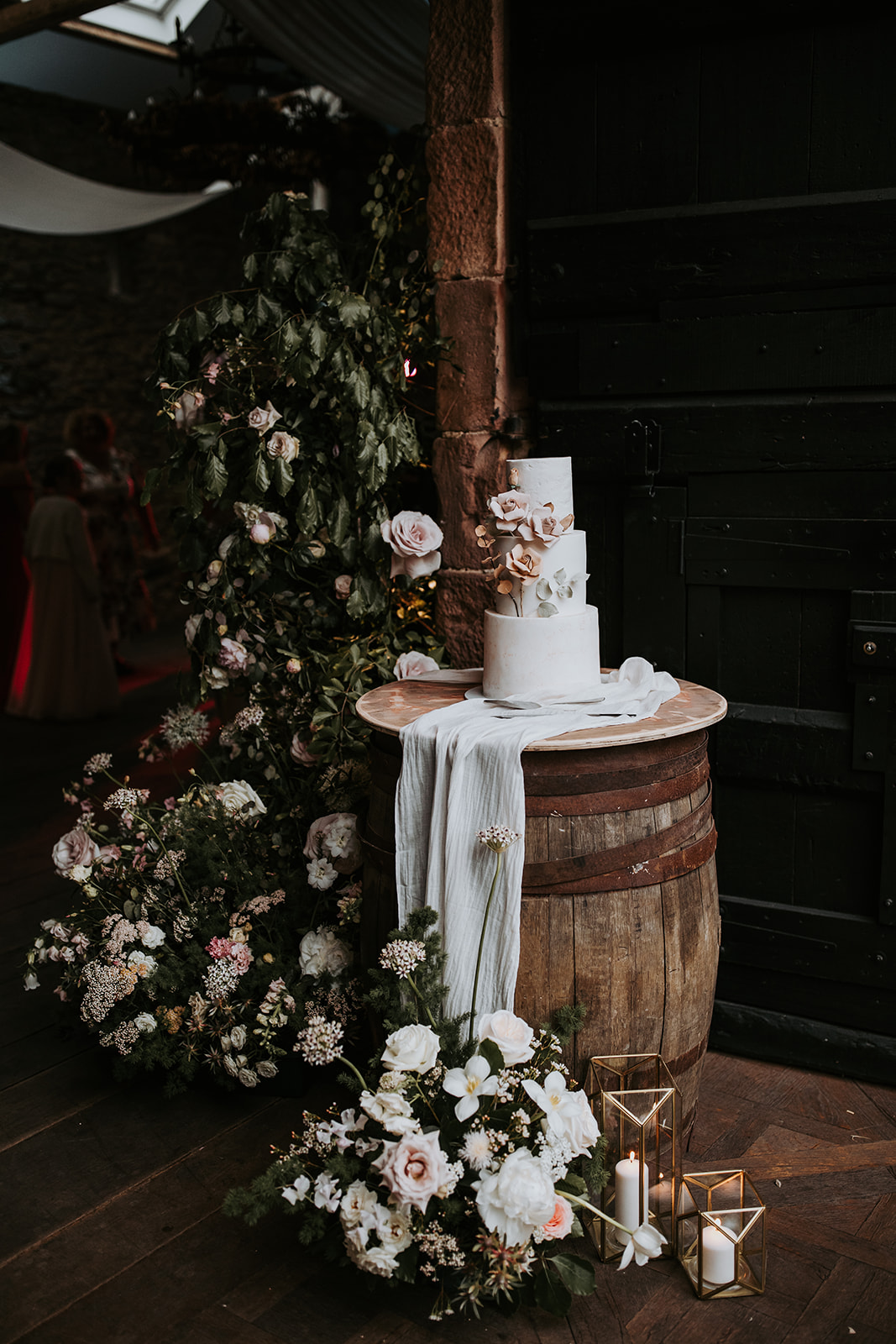 Flower arch with cake autumn wedding flowers