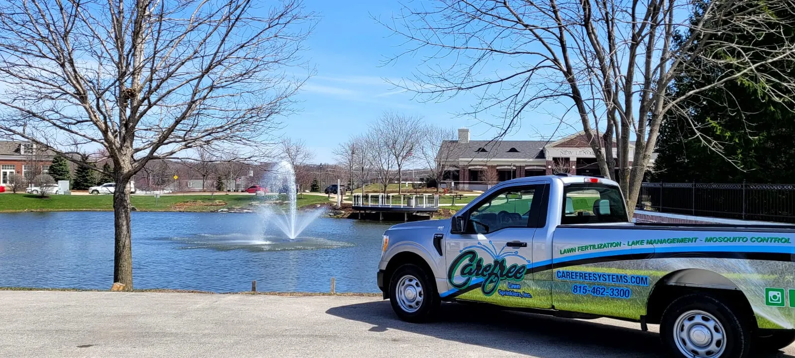 carefree-lawn-sprinklers-truck-next-to-fountain-in-new-lenox