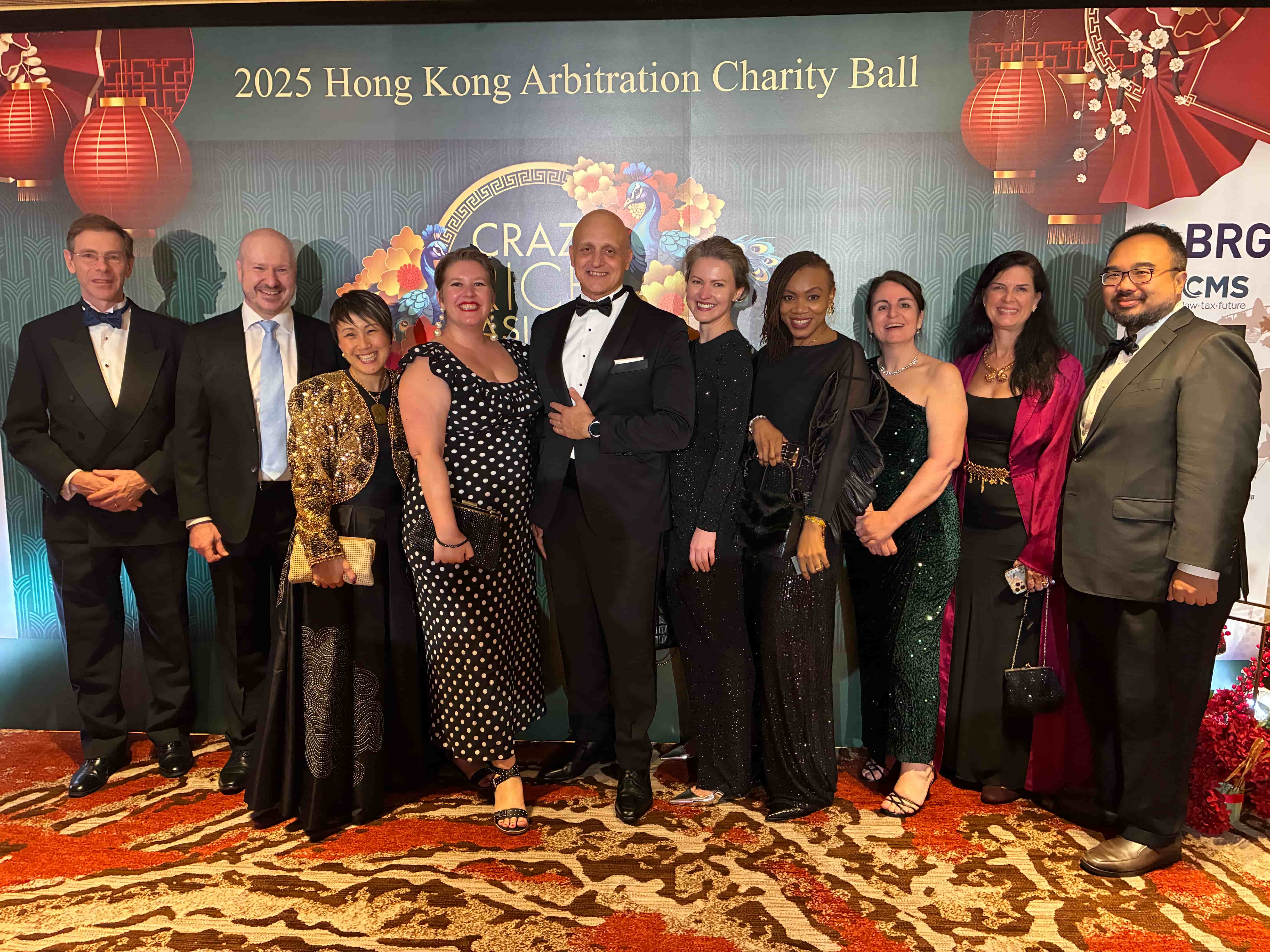 Beth Hackney, Margot Macinnis, Karen Petch, Sugano Yuri and Kotaro Fuji eating daan tat in Hong Kong bakery