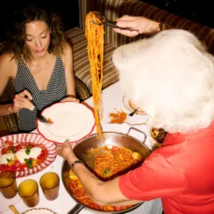 Authentic Italian pasta dinner in a cozy social setting at Casa Monti