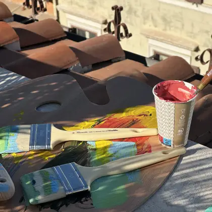 Colorful painting activity on a sunny terrace in Rome