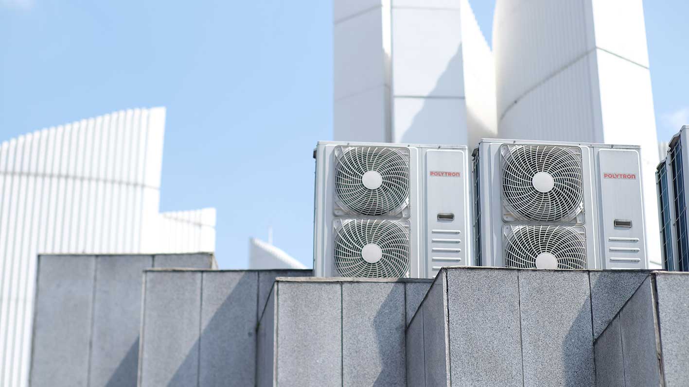 Industrial rooftop HVAC units illustrating the connected hydronic HVAC systems discussed in this article.