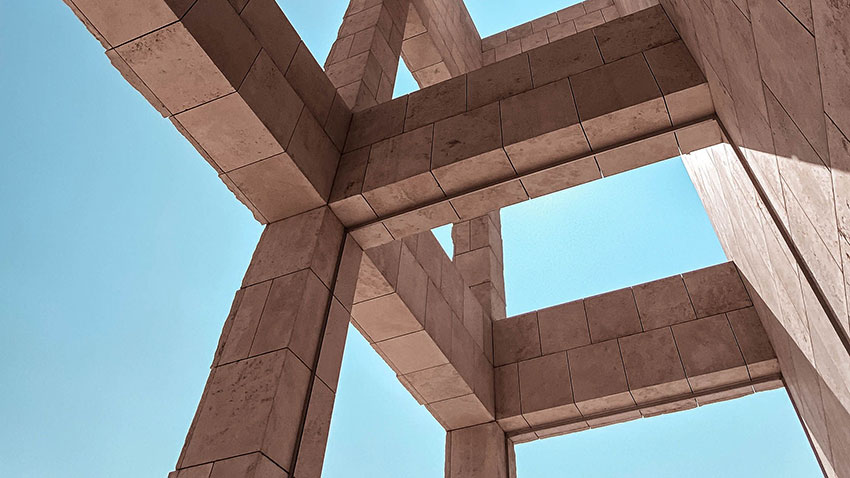 Modern building structure representing connected hydronic HVAC design workflows, automated engineering updates and physics-based digital twin modelling with Hysopt Designer.