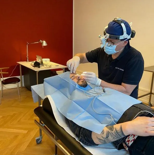 A man in a face surgery