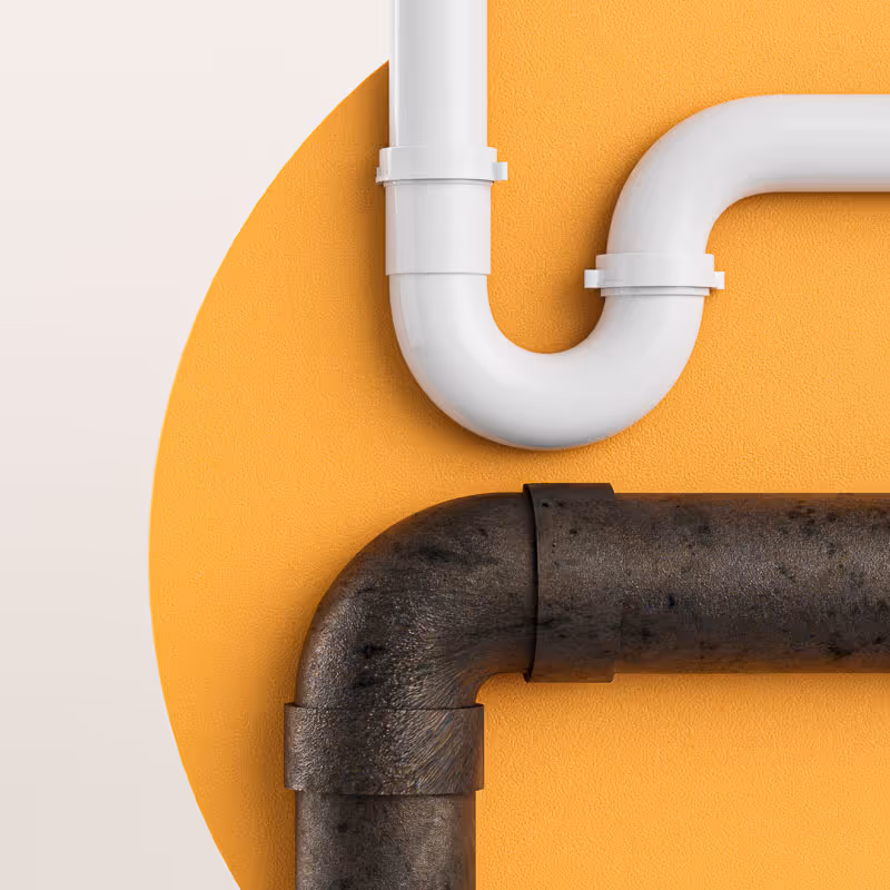 An image of a clogged tubular drain pipe and a branch line pipe