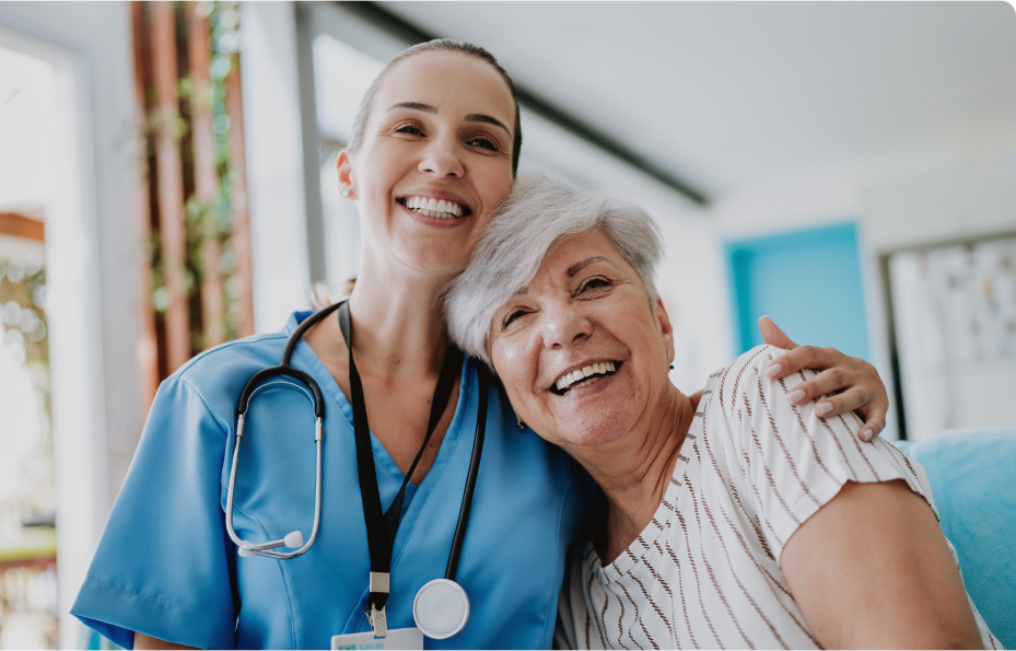 Nurse and patient laughing together